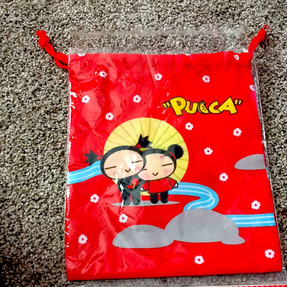 🆕 NWT 10 inches x 8 inches “Pucca” pouch.